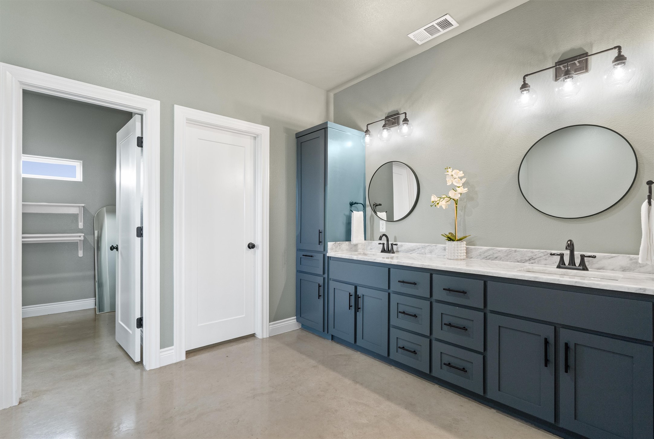 15073 Armstrong Estates Road Salado, TX 76571 - Photo 16 of 40 a bathroom with a double vanity sink and a mirror