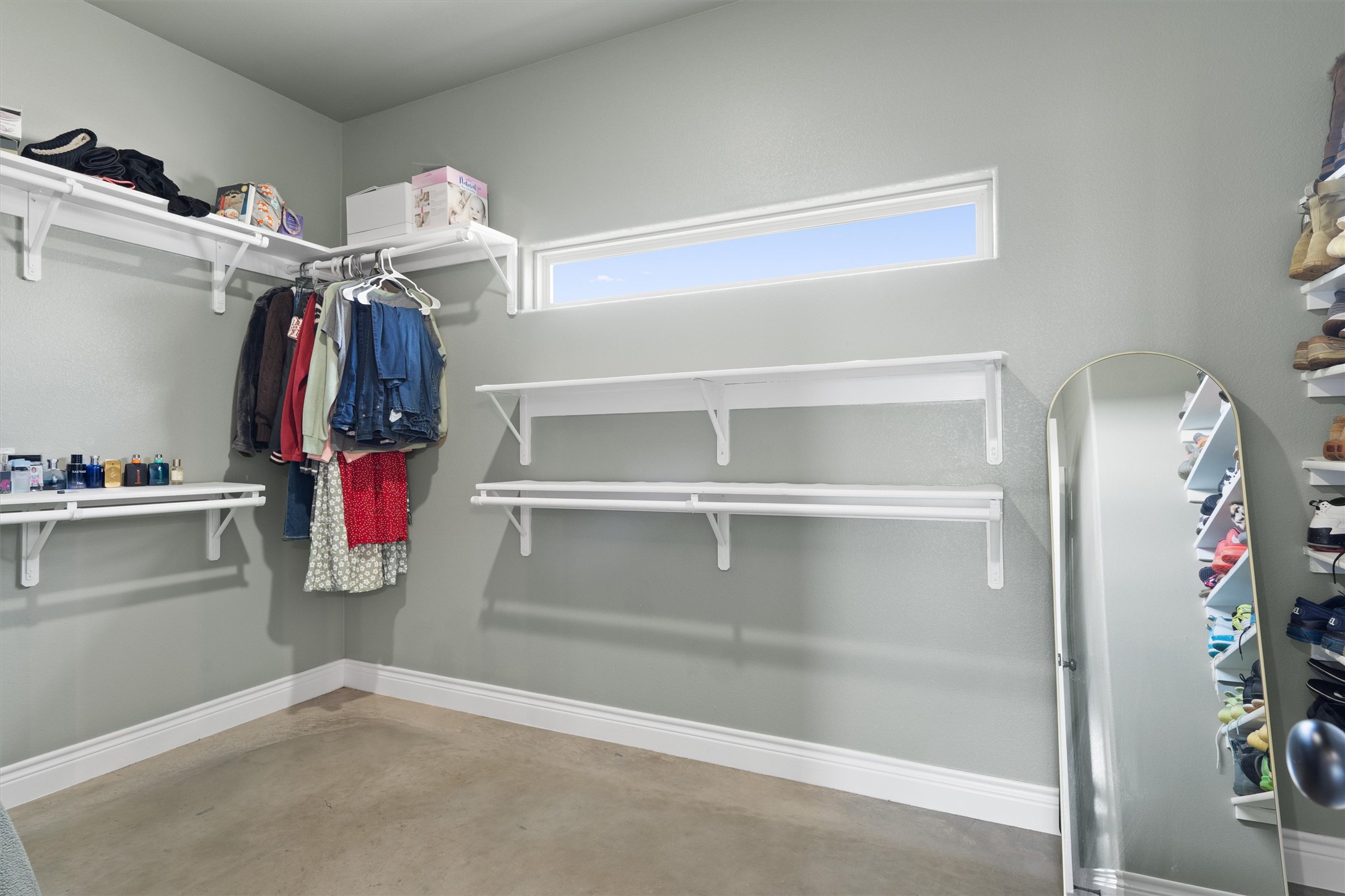 15073 Armstrong Estates Road Salado, TX 76571 - Photo 18 of 40 a view of walk in closet with clothes and shoes