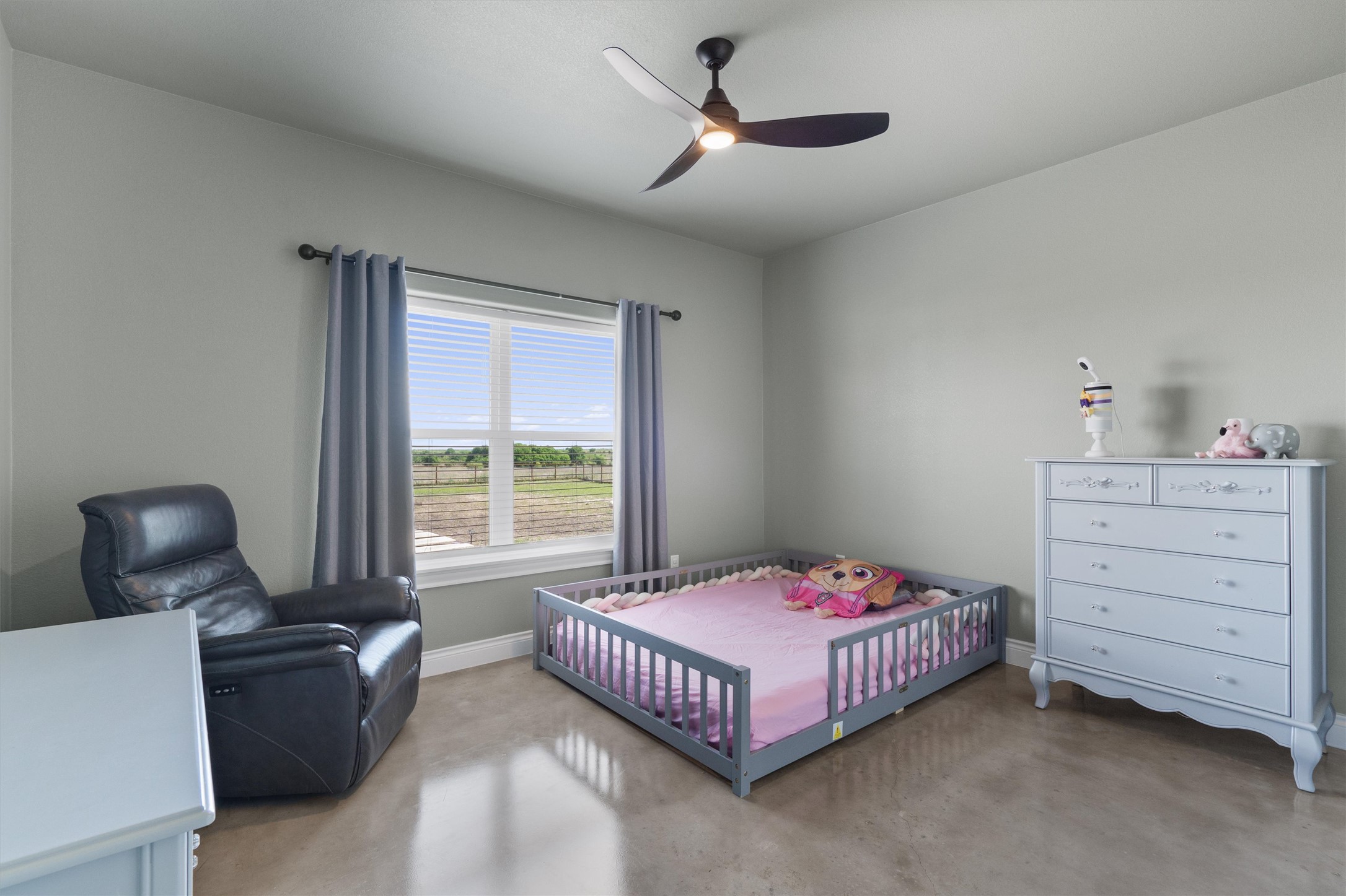 15073 Armstrong Estates Road Salado, TX 76571 - Photo 19 of 40 a bedroom with a bed and a window
