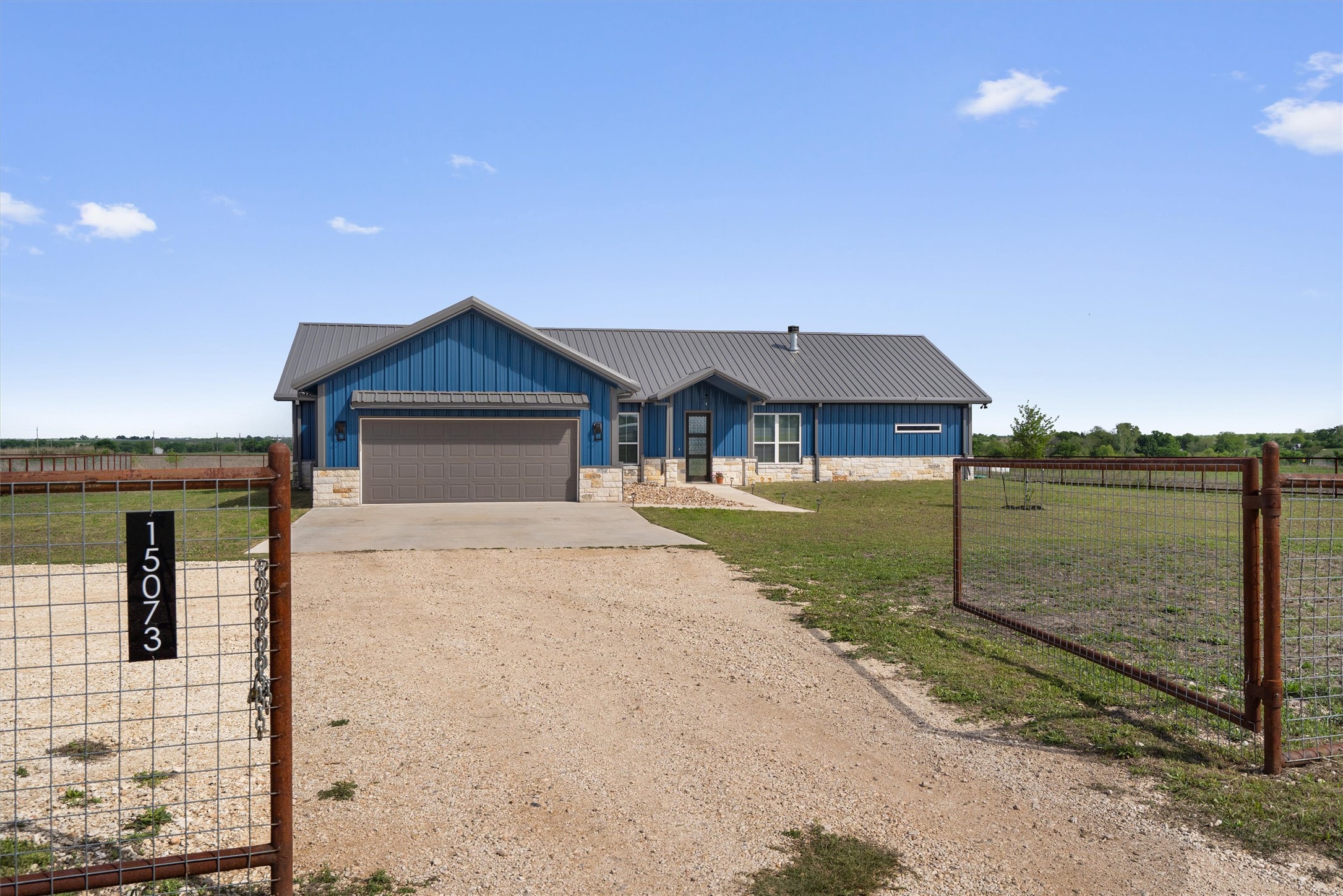 15073 Armstrong Estates Road Salado, TX 76571 - Photo 2 of 40 a front view of a house with garden