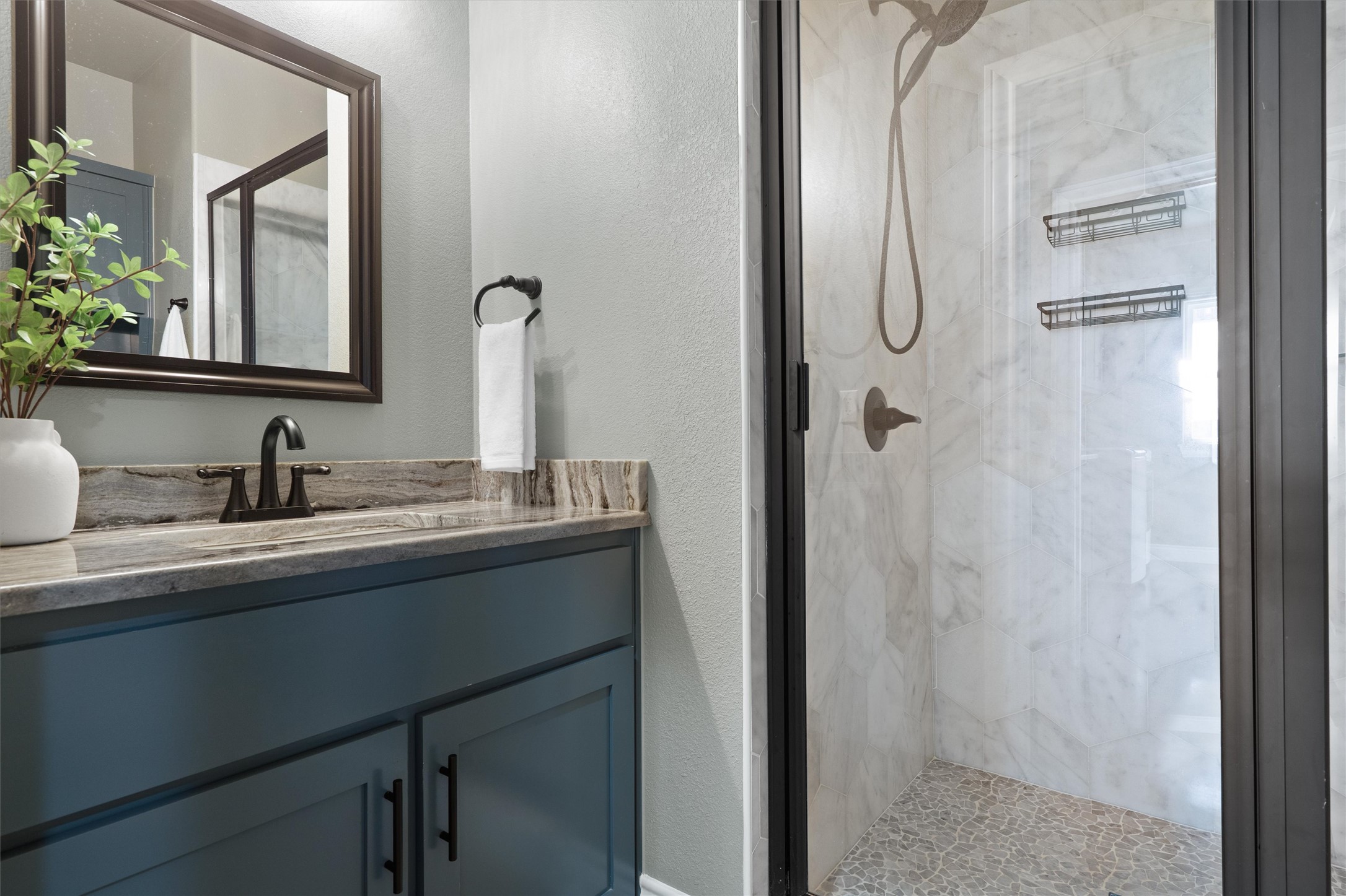 15073 Armstrong Estates Road Salado, TX 76571 - Photo 23 of 40 a bathroom with a granite countertop sink and mirror