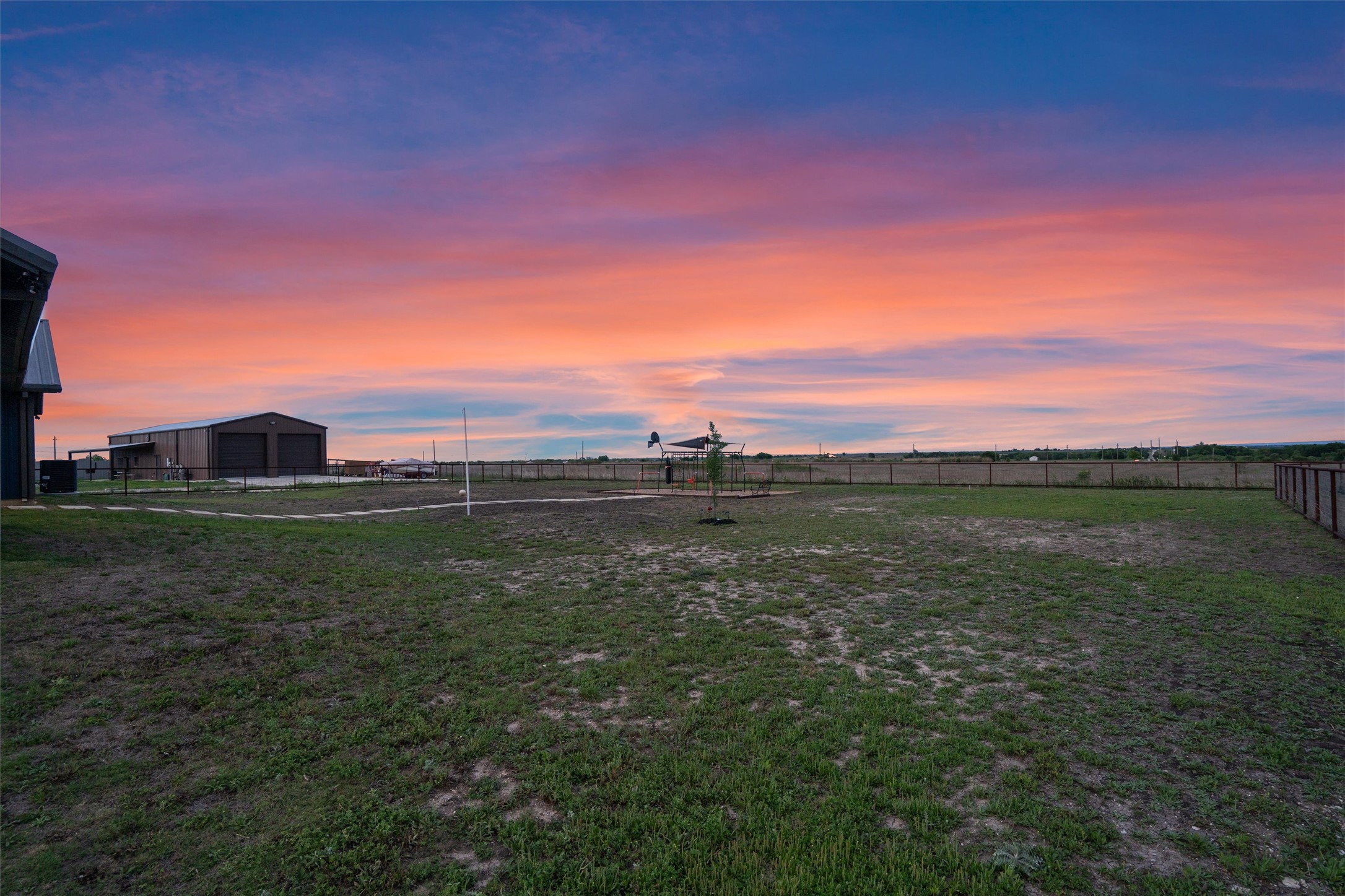 15073 Armstrong Estates Road Salado, TX 76571 - Photo 28 of 40 a view of a lush green outdoor space with a lake view