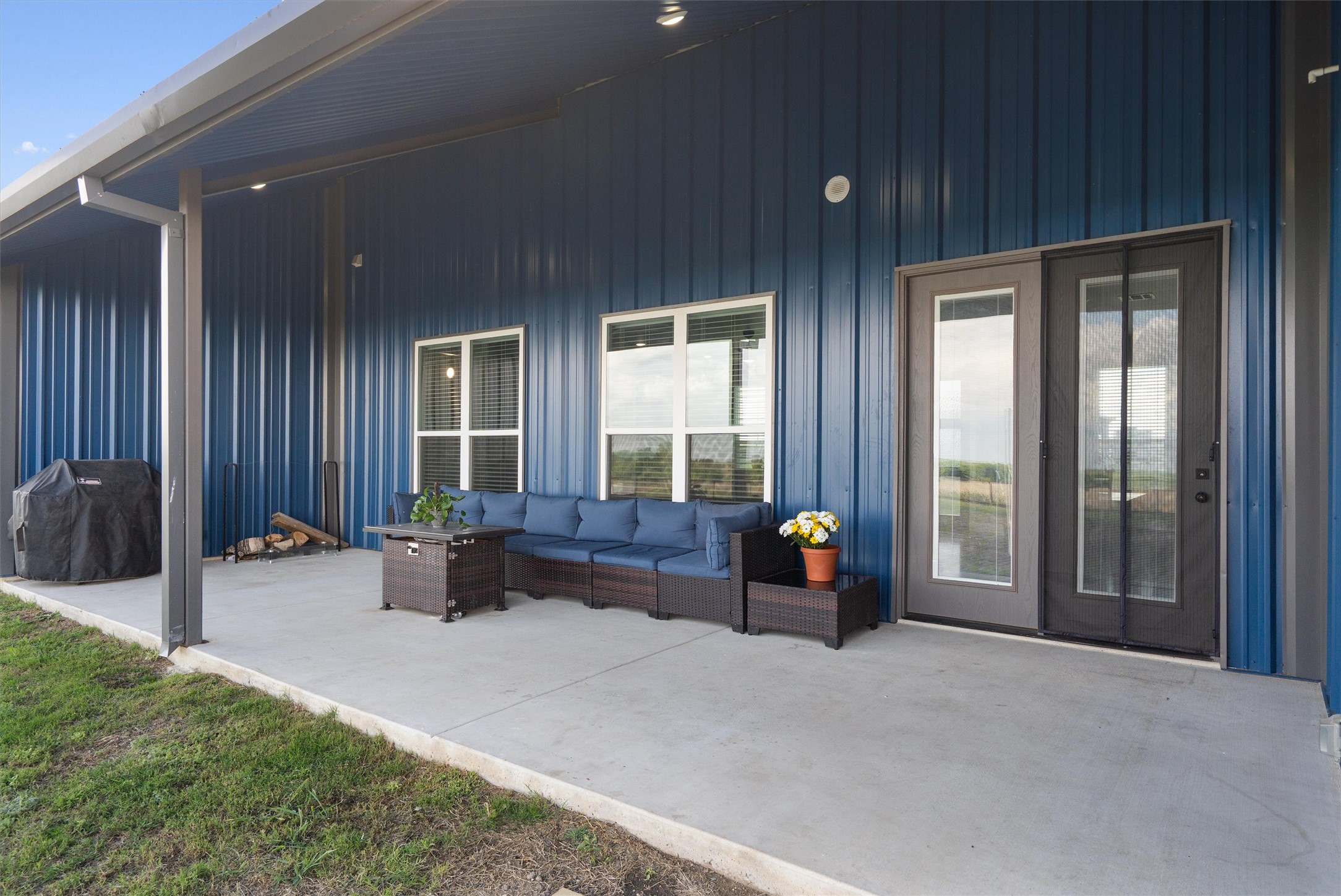 15073 Armstrong Estates Road Salado, TX 76571 - Photo 5 of 40 a view of living room with furniture and floor to ceiling window