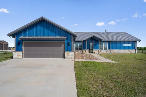 a front view of house with yard