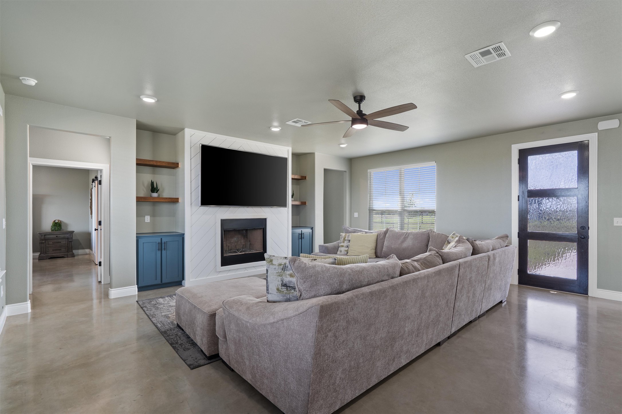 15073 Armstrong Estates Road Salado, TX 76571 - Photo 10 of 40 a living room with furniture and a fireplace