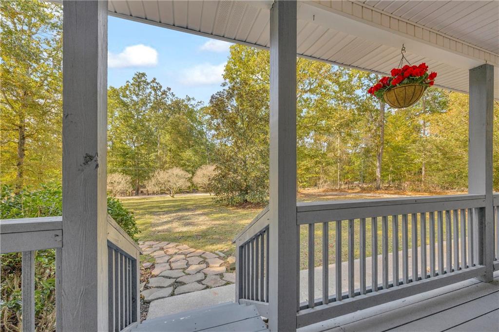 450 Stagecoach Way Danielsville, GA 30633 - Photo 3 of 65 a view of a room with a large window and front door
