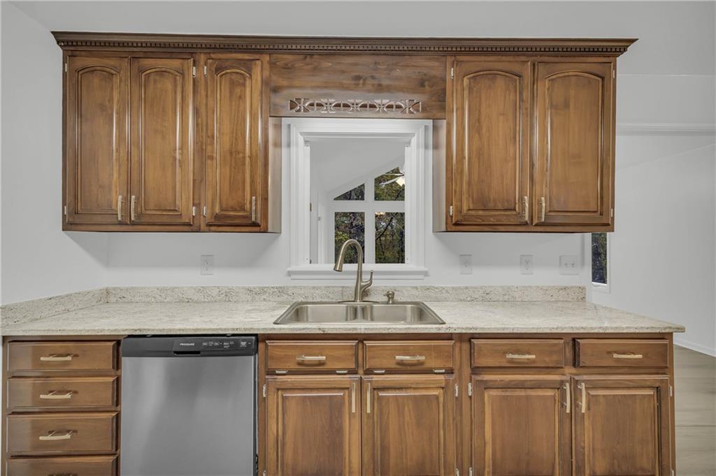 450 Stagecoach Way Danielsville, GA 30633 - Photo 31 of 65 a view white cabinets and a sink