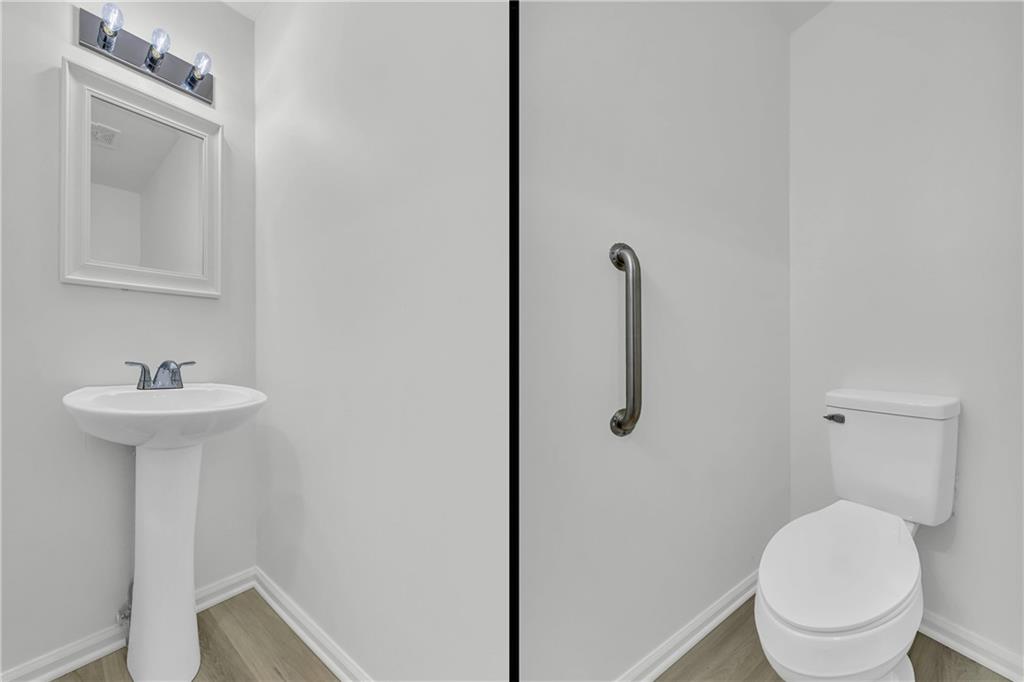 450 Stagecoach Way Danielsville, GA 30633 - Photo 39 of 65 a bathroom with a sink toilet and shower
