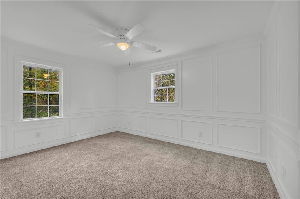 450 Stagecoach Way Danielsville, GA 30633 - Photo 46 of 65 an empty room with windows