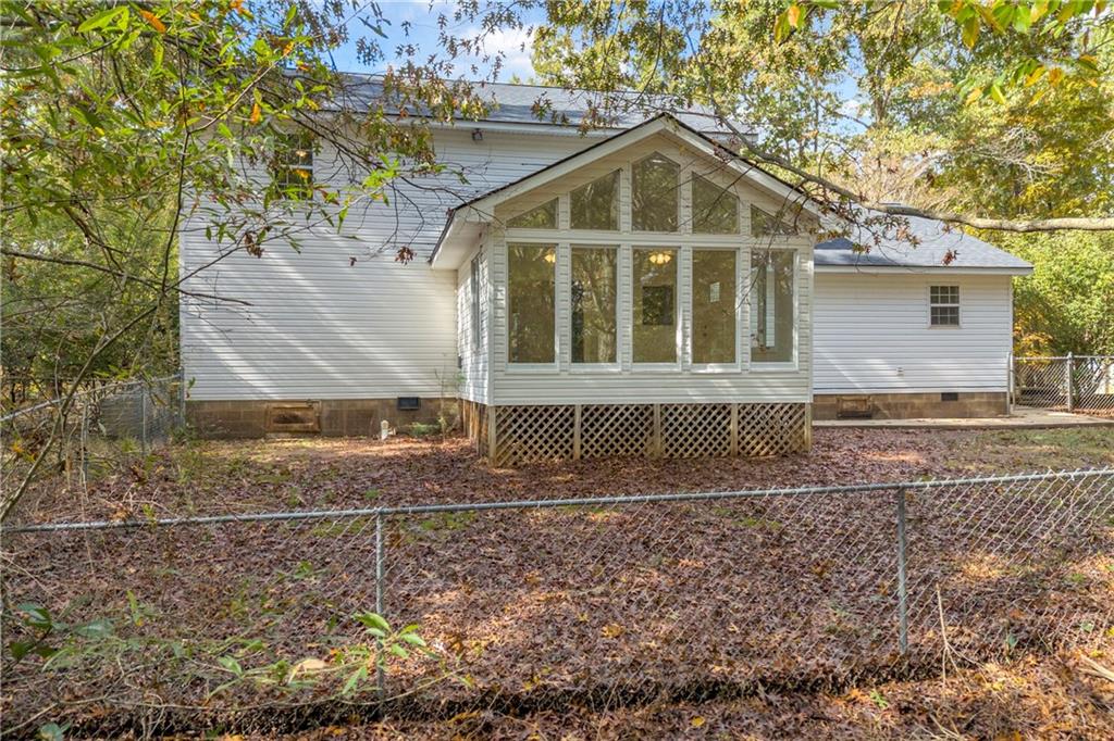450 Stagecoach Way Danielsville, GA 30633 - Photo 58 of 65 a front view of a house with a yard