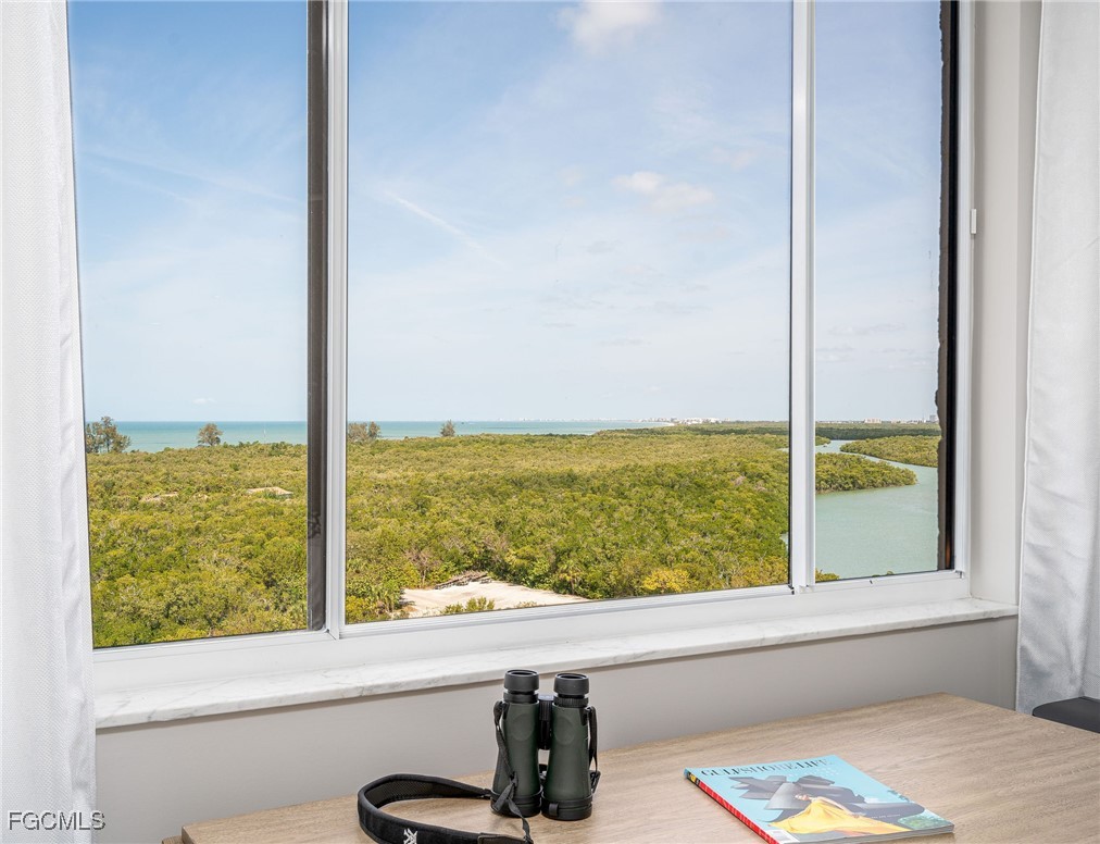 17 Bluebill Avenue, Unit 903 Naples, FL 34108 - Photo 13 of 33 a view of a window and an ocean from a window