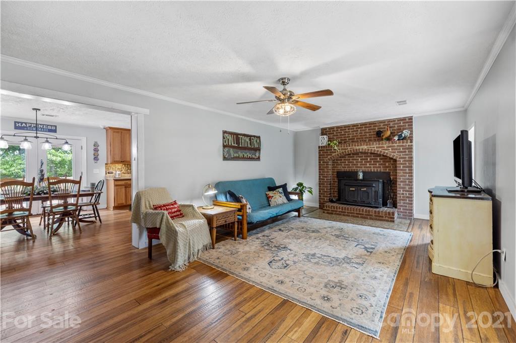 553 Sandifer Road York, SC 29745 - Photo 14 of 24 a living room with furniture wooden floor and a fireplace
