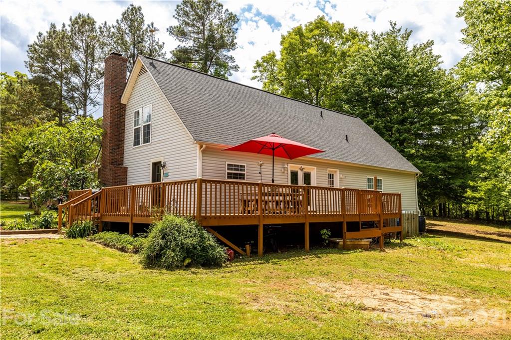 553 Sandifer Road York, SC 29745 - Photo 4 of 24 a view of a house with a yard patio and deck