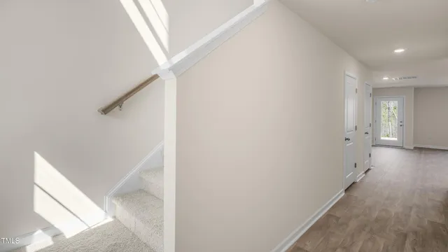 a view of hallway with stairs