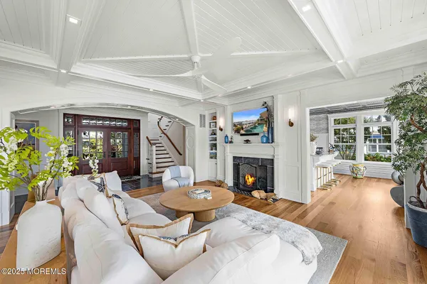 a kitchen with stainless steel appliances granite countertop a stove refrigerator and cabinets