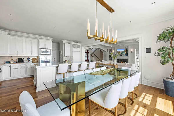 a white bath tub sitting in a bathroom next to a window