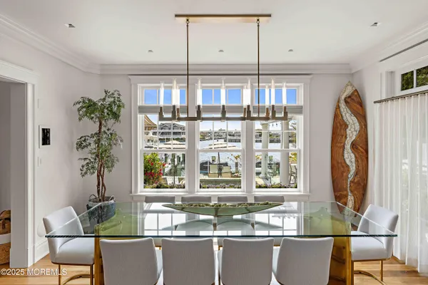 a large bathroom with a granite countertop sink a mirror and a shower