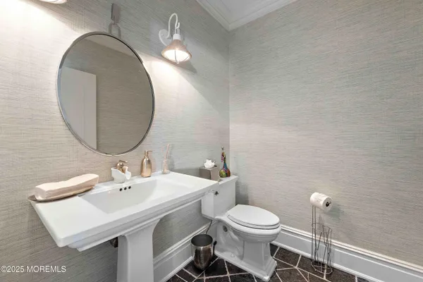 a spacious bedroom with a bed and a table in it