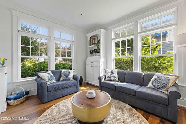 a bedroom with bed and window