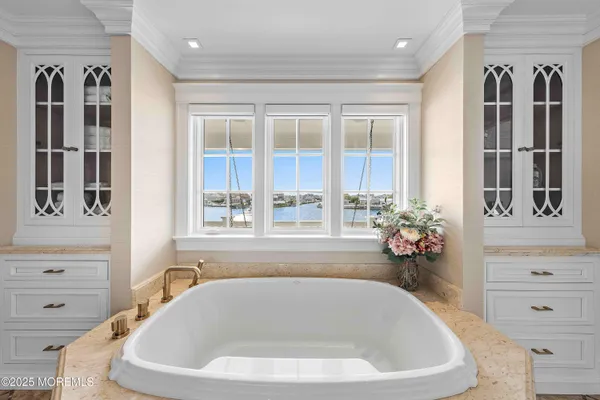 a view of a balcony with furniture