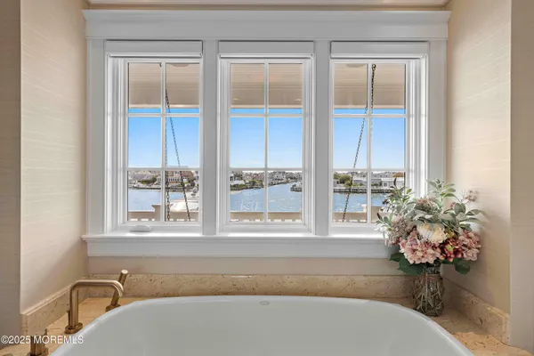 a view of a chairs and table in the patio