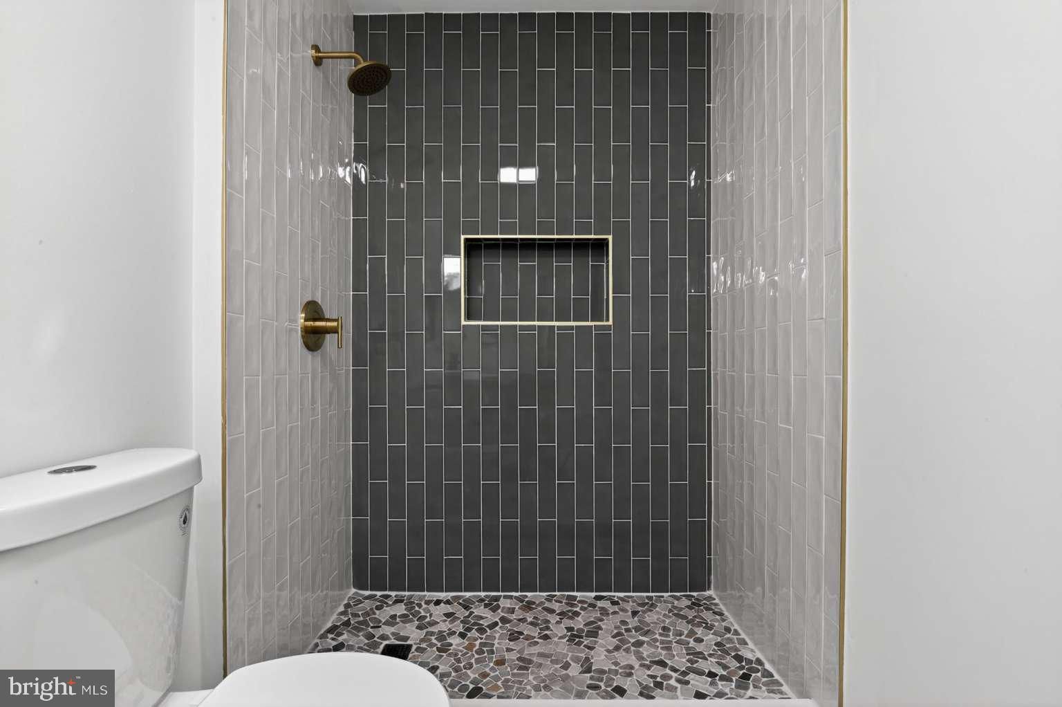 271 Academy Road Woodbine, NJ 08270 - Photo 29 of 37 a bathroom with a toilet and a shower