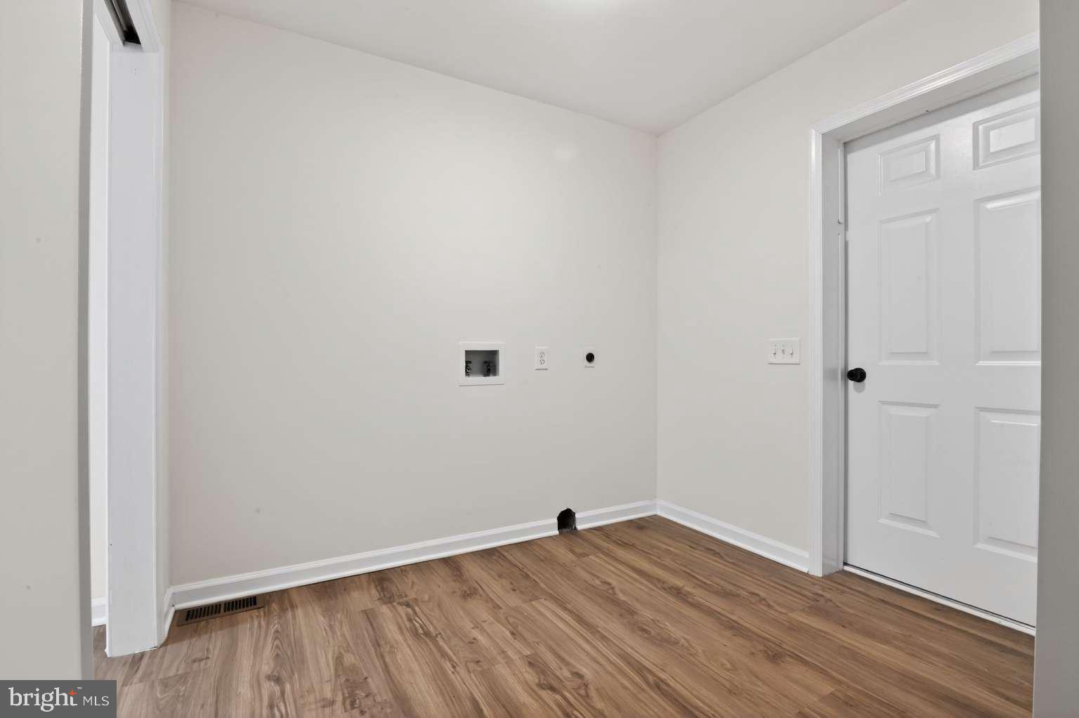 271 Academy Road Woodbine, NJ 08270 - Photo 36 of 37 a view of an empty room with wooden floor
