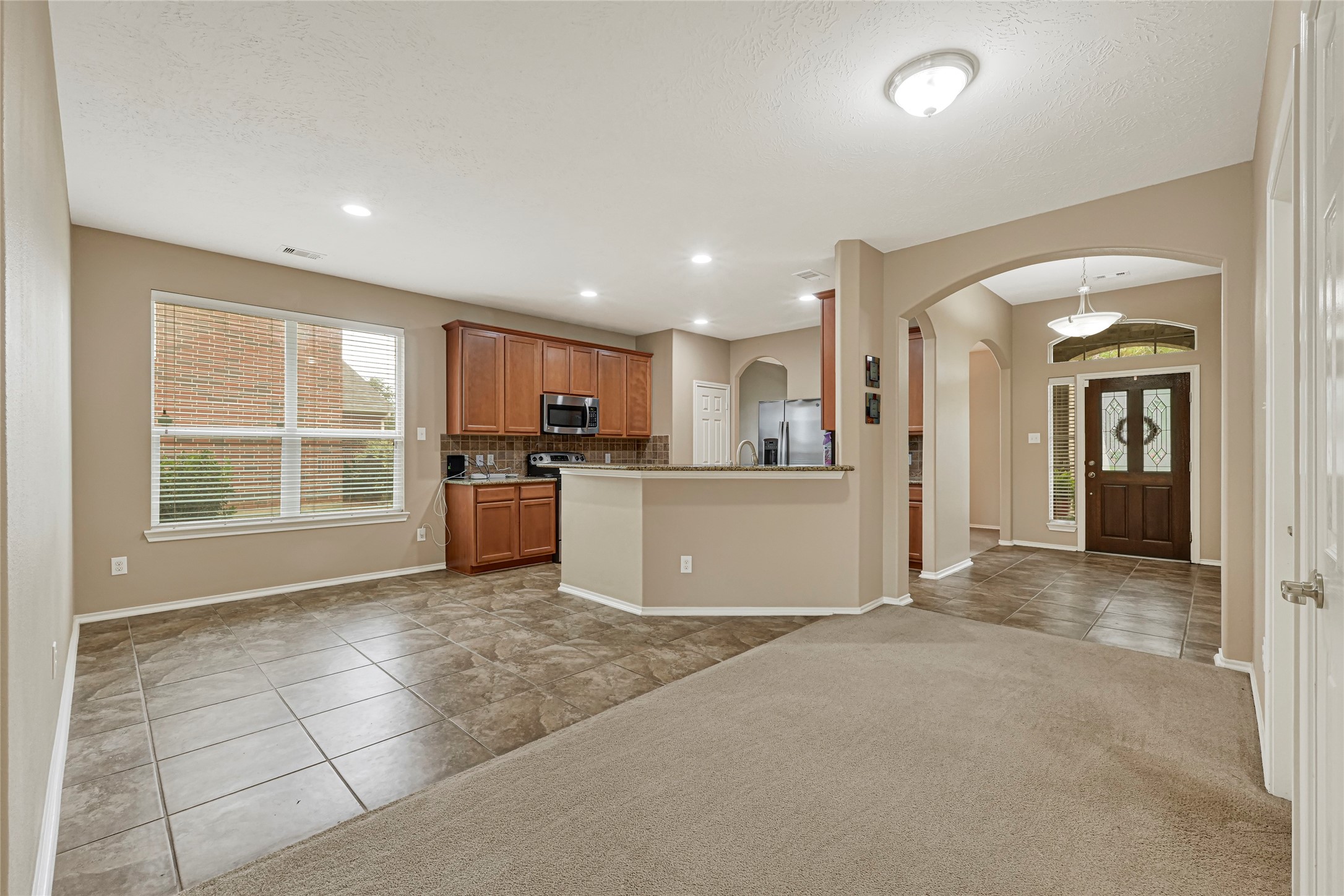 13610 Summer Spring Lane Rosharon, TX 77583 - Photo 8 of 25 Spacious and open concept kitchen/living