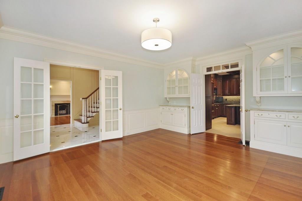 103 Revolutionary Road Concord, MA 01742 - Photo 12 of 39 wooden floor in an empty room with a window