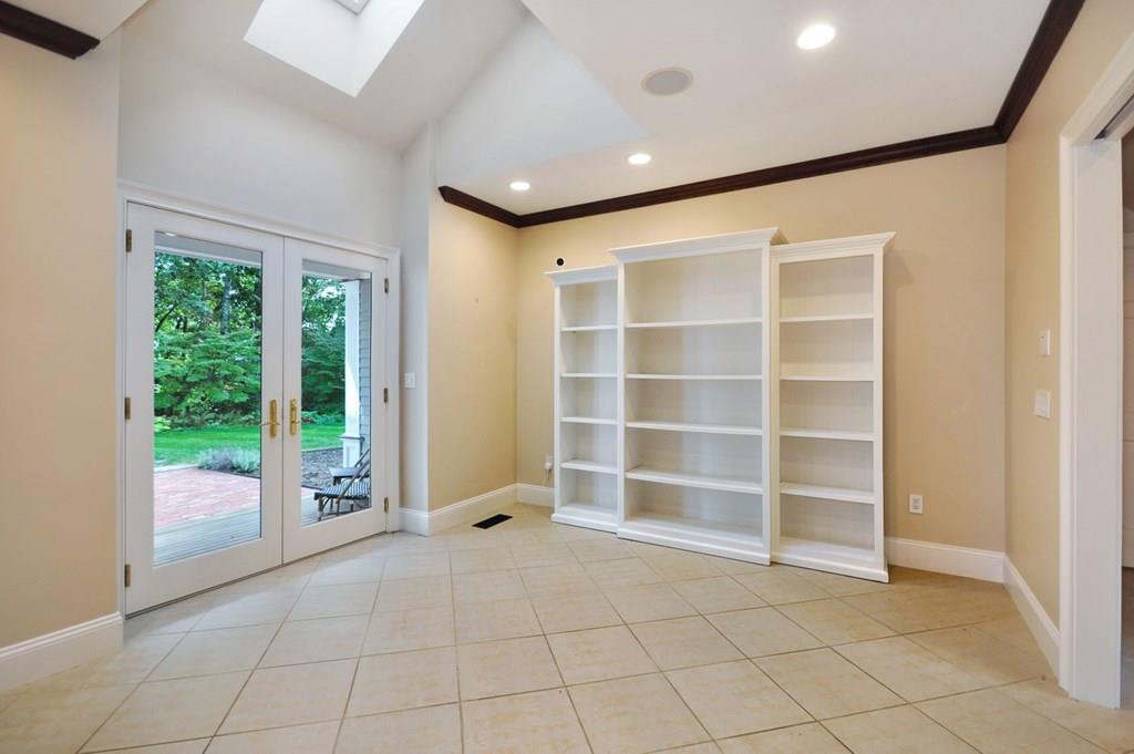103 Revolutionary Road Concord, MA 01742 - Photo 16 of 39 a view of an empty room with a balcony