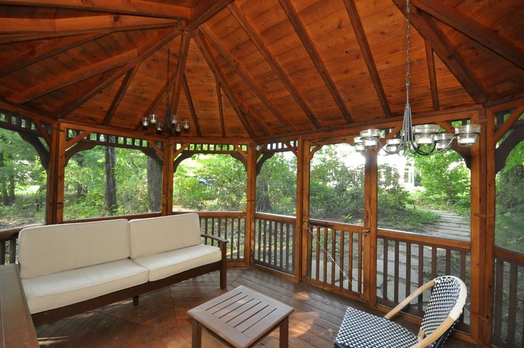 103 Revolutionary Road Concord, MA 01742 - Photo 21 of 39 a view of a two chairs in the patio