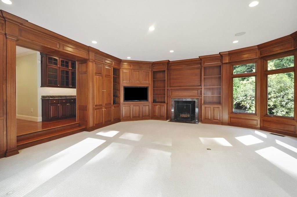 103 Revolutionary Road Concord, MA 01742 - Photo 25 of 39 a view of a livingroom with a fireplace