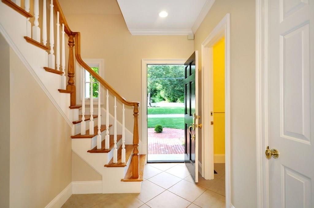 103 Revolutionary Road Concord, MA 01742 - Photo 27 of 39 a view of an entryway with staircase
