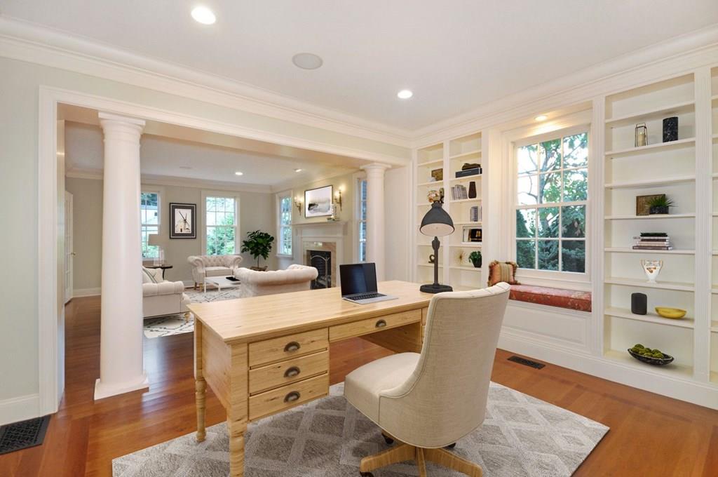 103 Revolutionary Road Concord, MA 01742 - Photo 10 of 39 a room with stainless steel appliances kitchen island granite countertop furniture and a wooden floor
