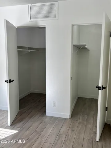 an empty room with closet
