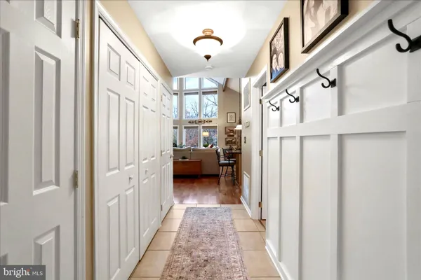 a view of a hallway view with staircase
