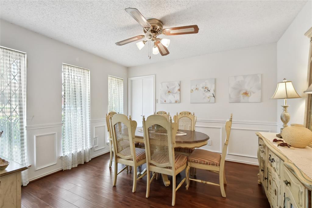 3129 Regency Carrollton, TX 75007 - Photo 2 of 29 a dining room with furniture and window