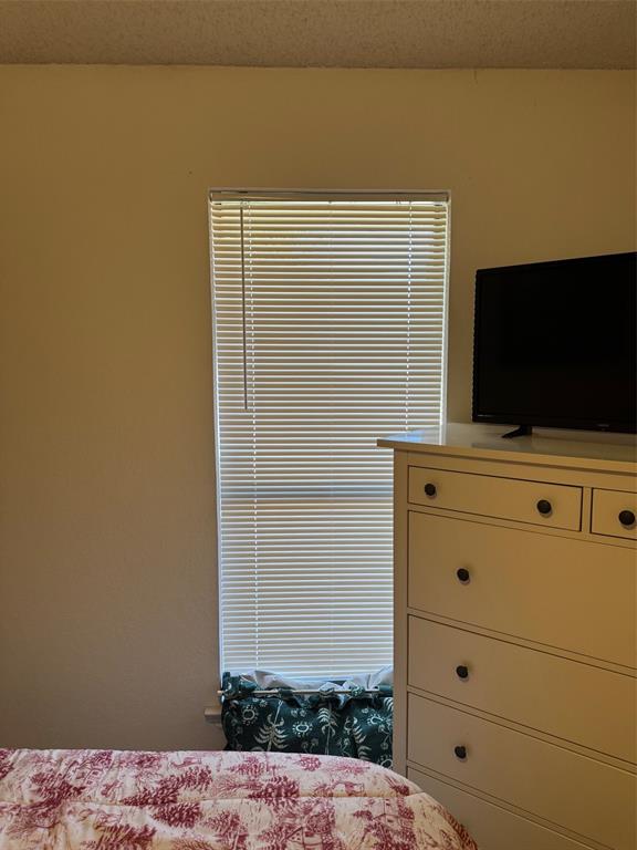 3129 Regency Carrollton, TX 75007 - Photo 25 of 29 a view of room with flat screen tv