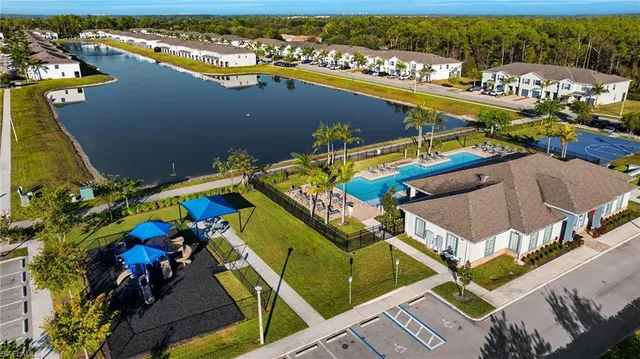 an aerial view of a house with a swimming pool
