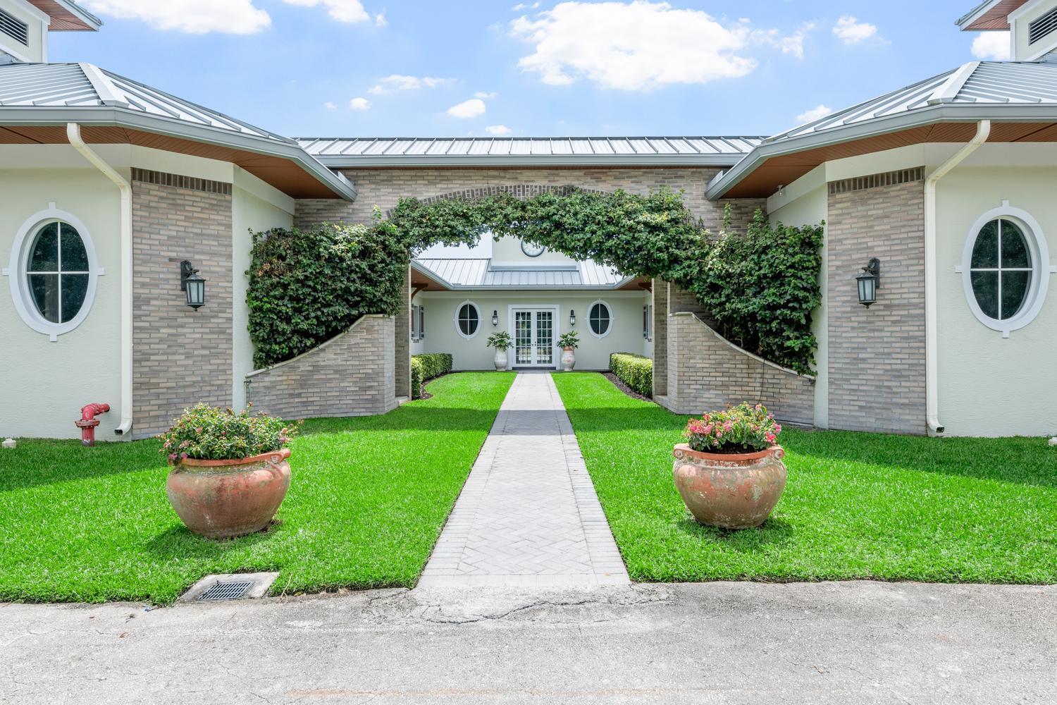 3454 Grand Prix Farms Road Wellington, FL 33414 - Photo 10 of 44 072-143-DSC 5161-1500x1000