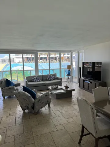 a view of a hallway with seating area