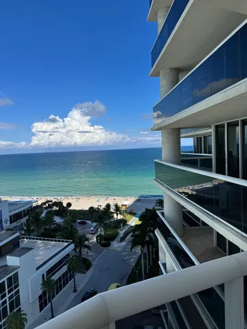 an outdoor space with furniture and garden view