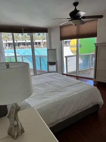 a view of a livingroom with wooden floor