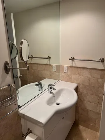 a bathroom with a shower and toilet