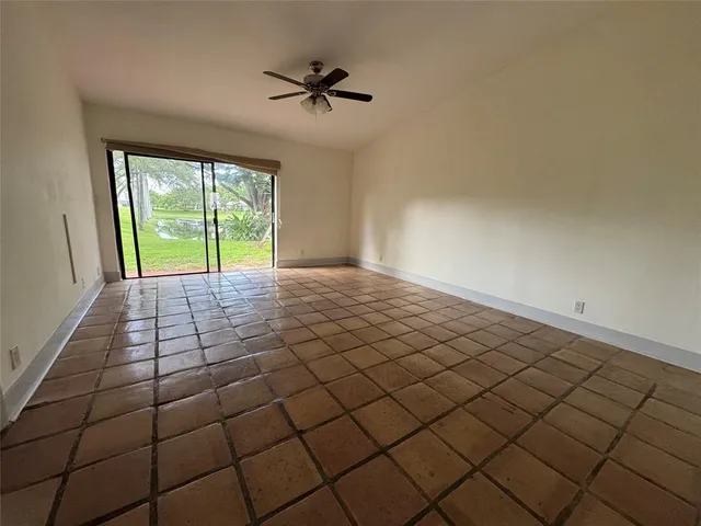 a view of a livingroom and window