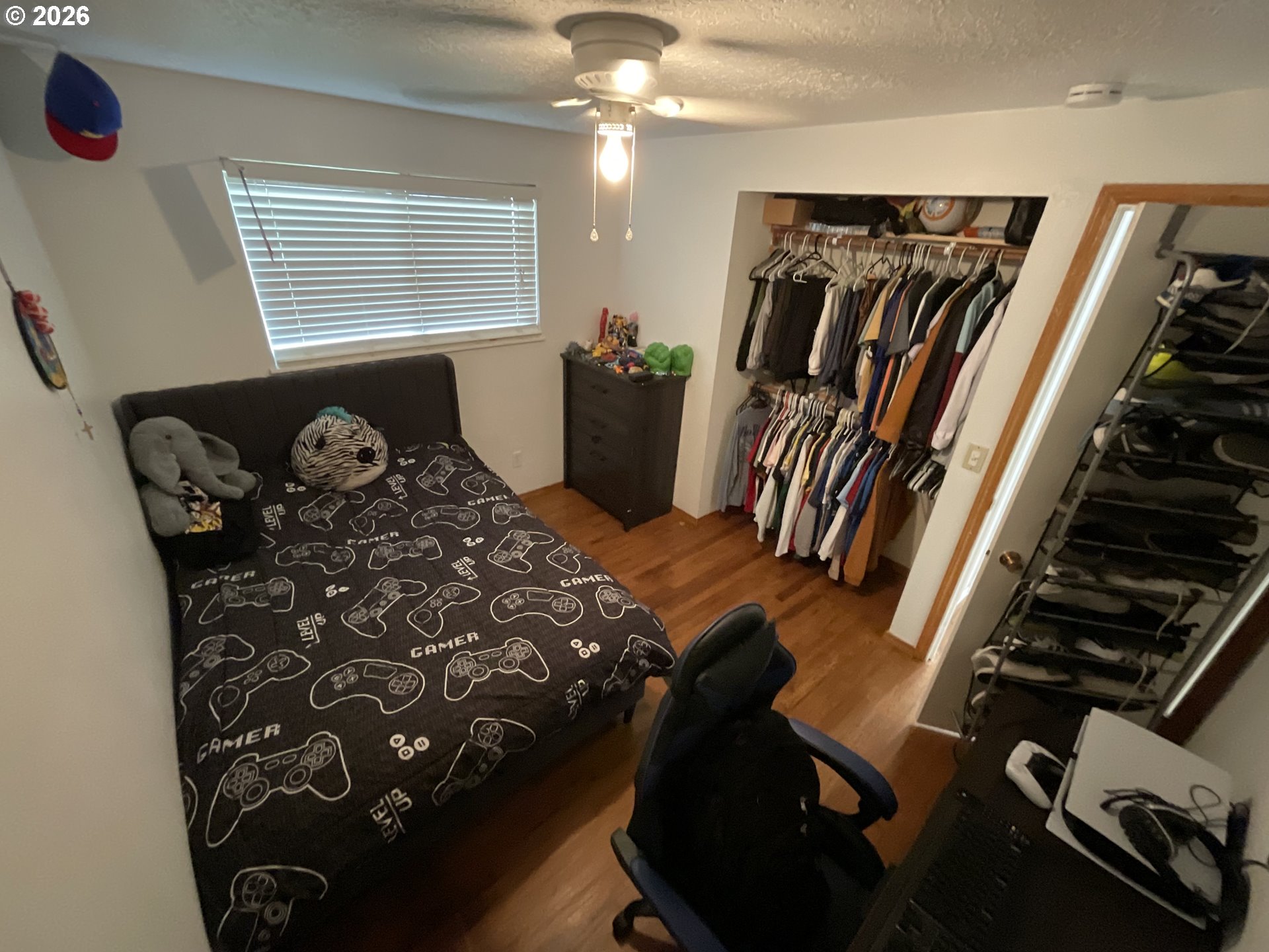 19305 Southwest York Street Beaverton, OR 97003 - Photo 23 of 34 a bedroom with furniture and a window