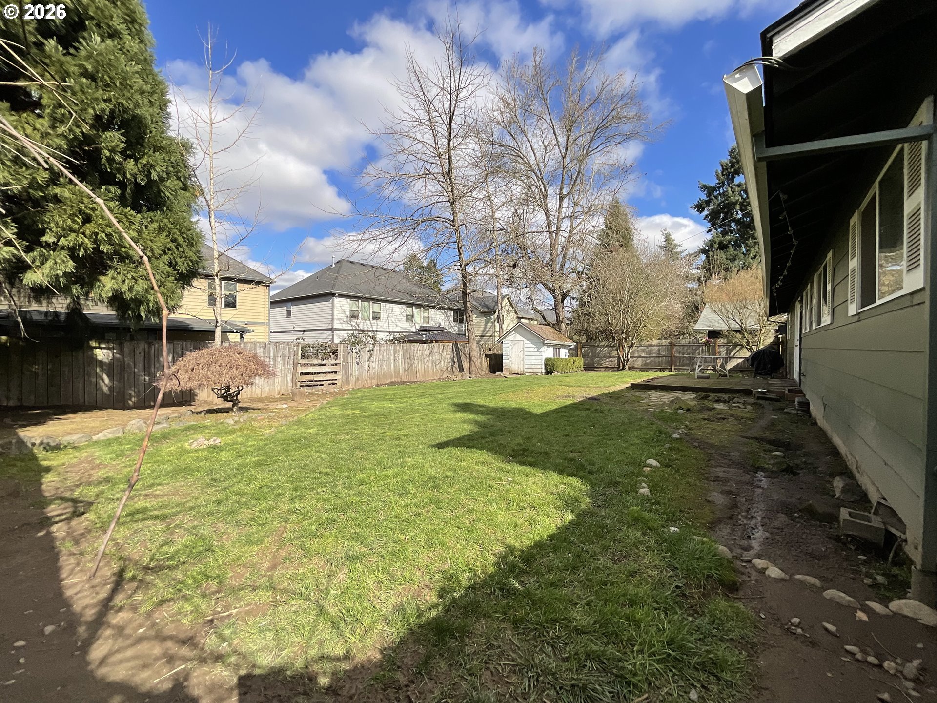 19305 Southwest York Street Beaverton, OR 97003 - Photo 27 of 34 a view of a house with a yard