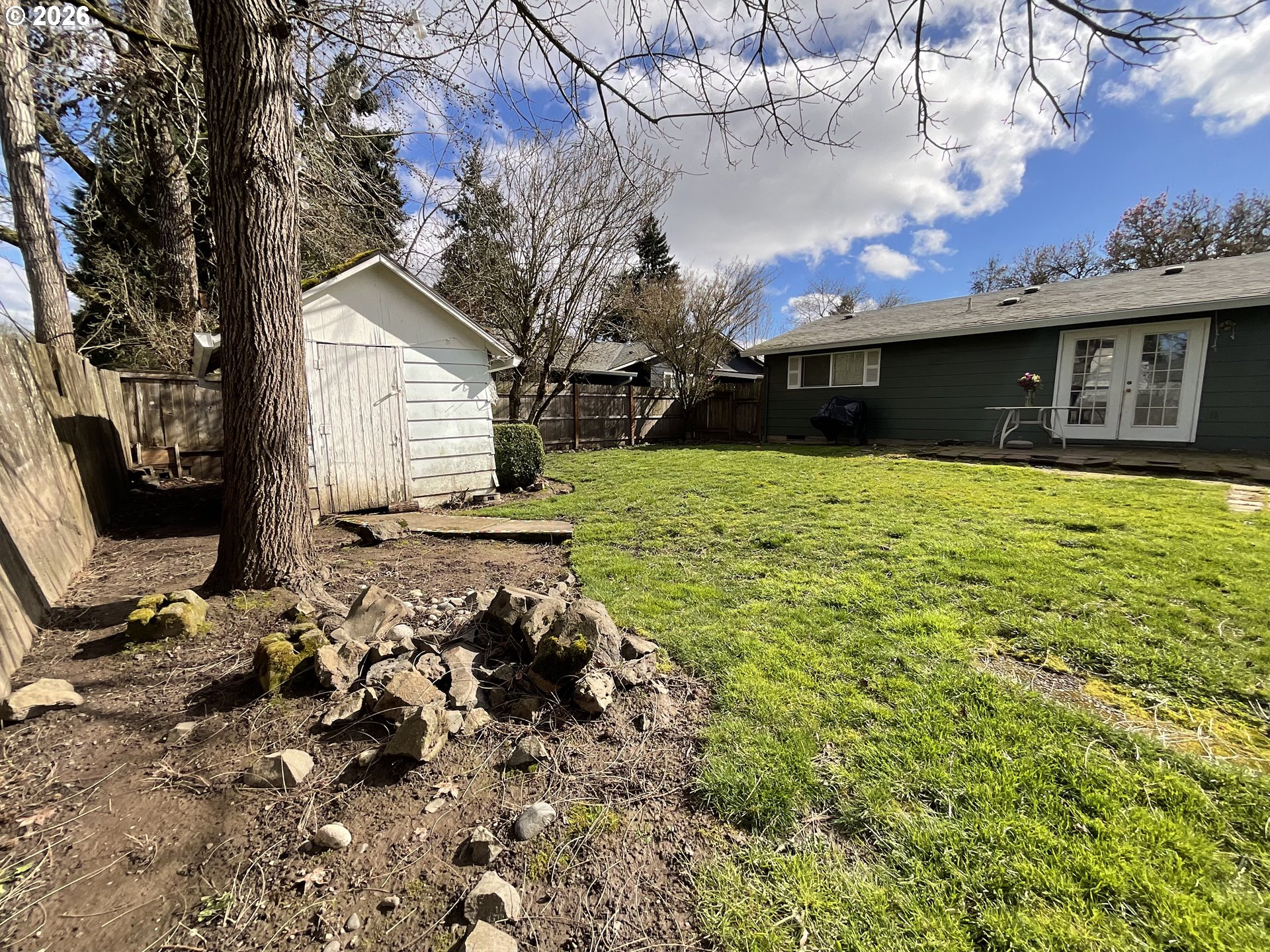 19305 Southwest York Street Beaverton, OR 97003 - Photo 31 of 34 a view of a house with a yard