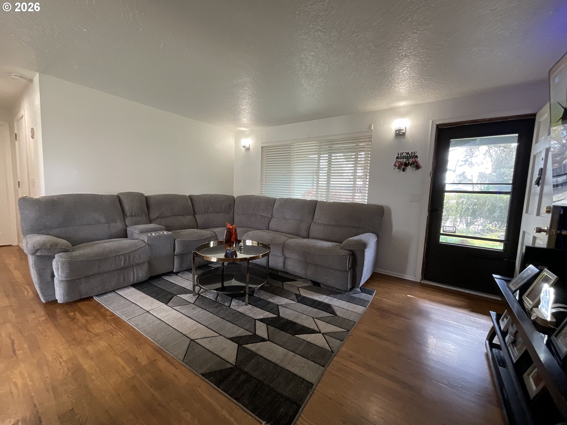 19305 Southwest York Street Beaverton, OR 97003 - Photo 8 of 34 a living room with furniture window and wooden floor