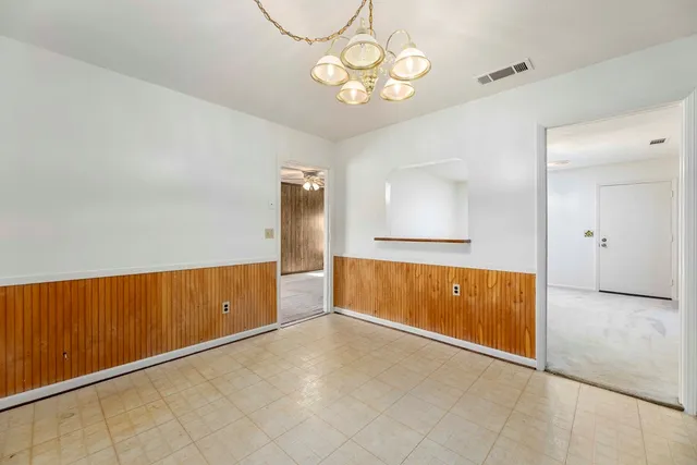 a view of a kitchen with cabinets